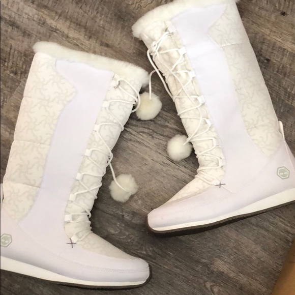 white lace up snow boots
